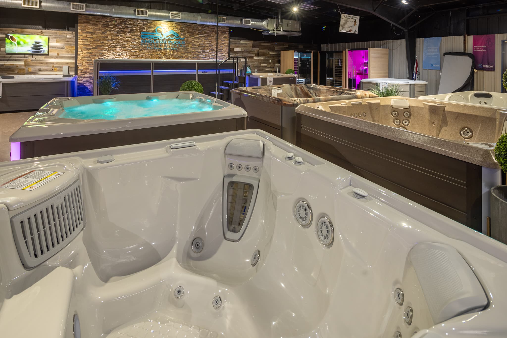 Hot Spring spas filled and running on the East Texas Hot Tub Tyler showroom floor