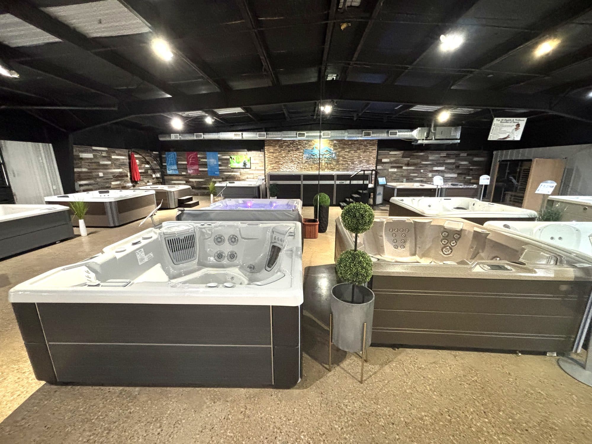 Hot tubs on the showroom floor at East Texas Hot Tub Co.