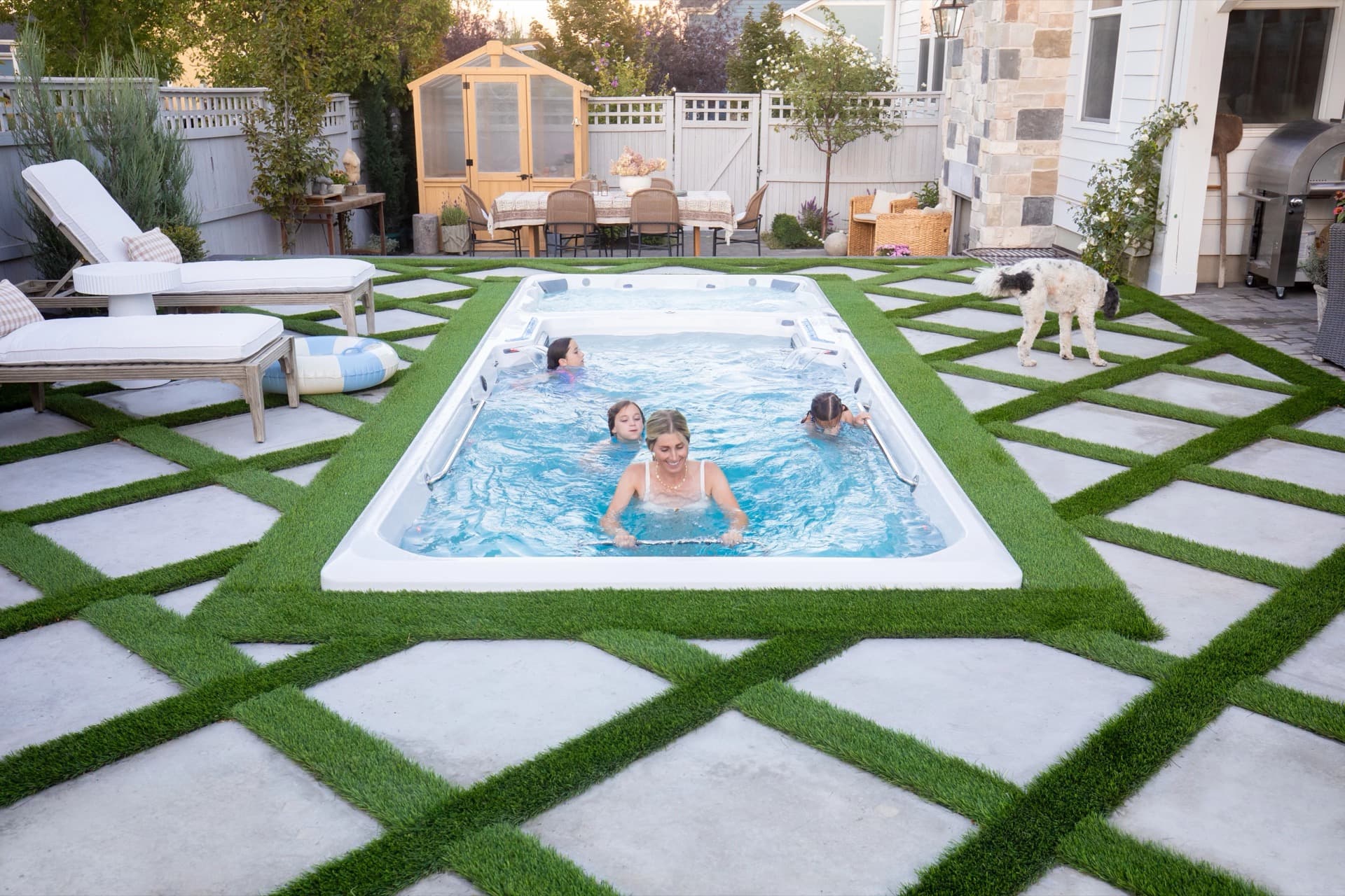 Family enjoying an Endless Pools swim spa