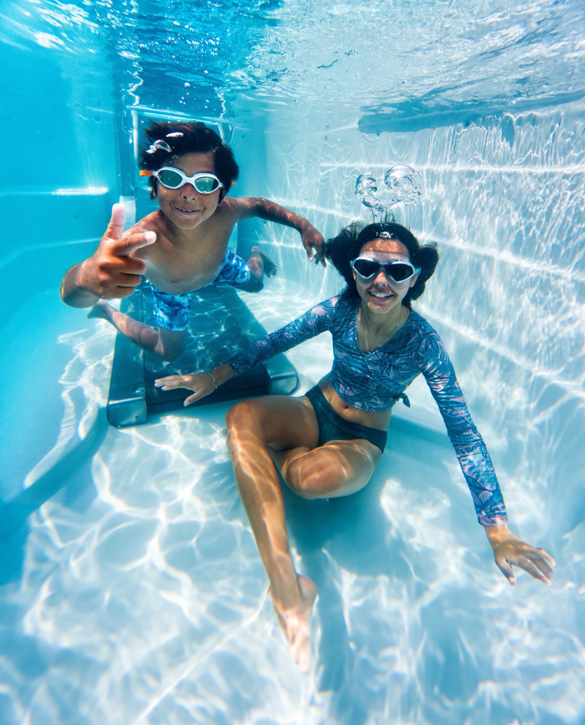 Kids swimming underwater in Endless Pools