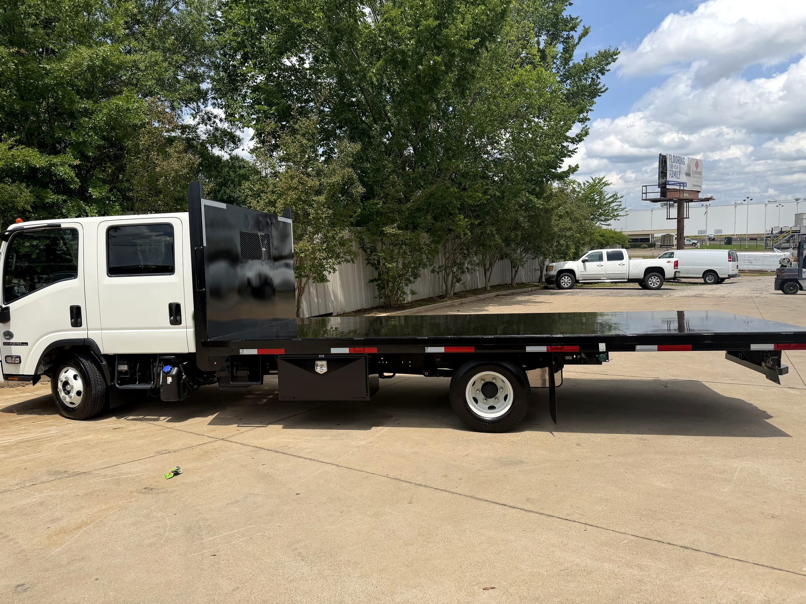 East Texas Hot Tub flatbed delivery truck used for in-house hot tub and swim spa delivery in Tyler and Longview